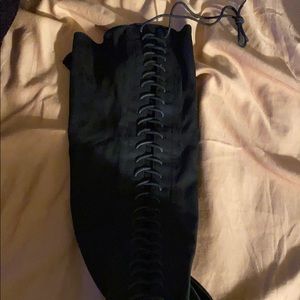 Thigh high lace up boot